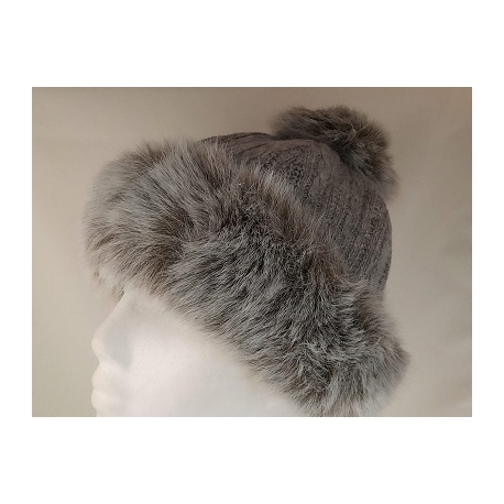 CAPPELLO BIMBA CON BORDI E POMPON IN PELLICCIA SINTETICA